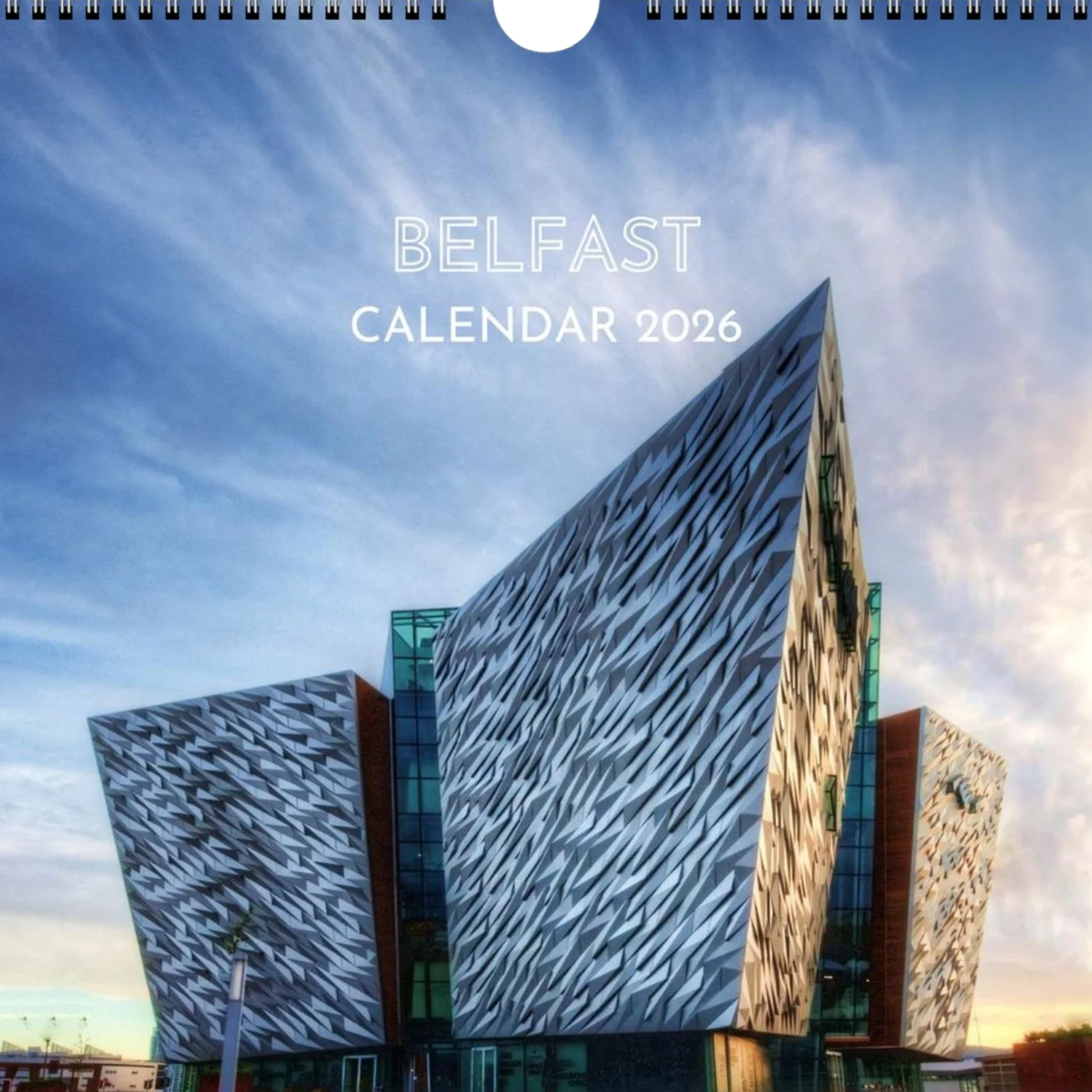 Belfast Calendar 2026 cover image featuring Titanic Museum building against a blue sky.