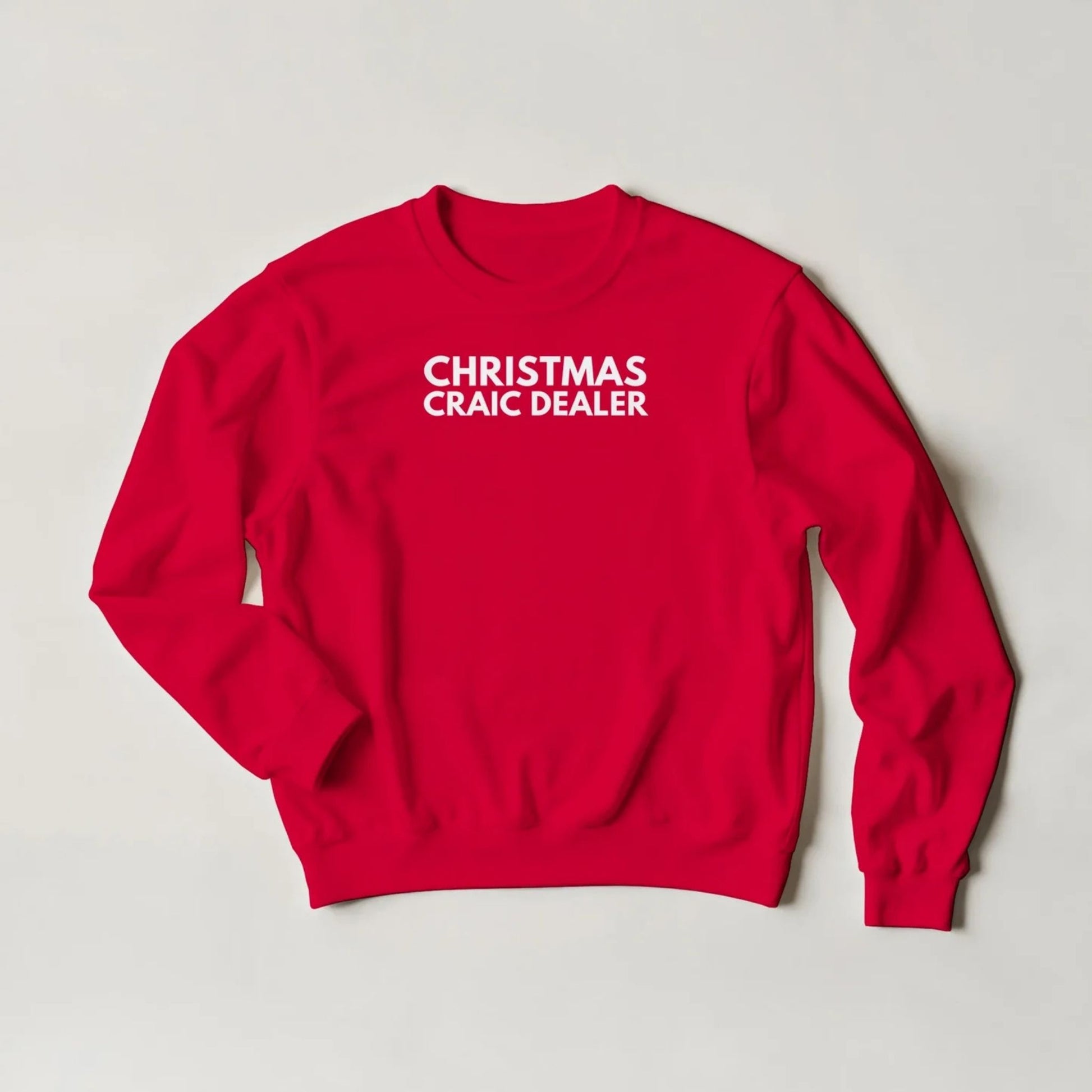 Red sweatshirt with Irish humour 'Christmas Craic Dealer' text on a light grey background