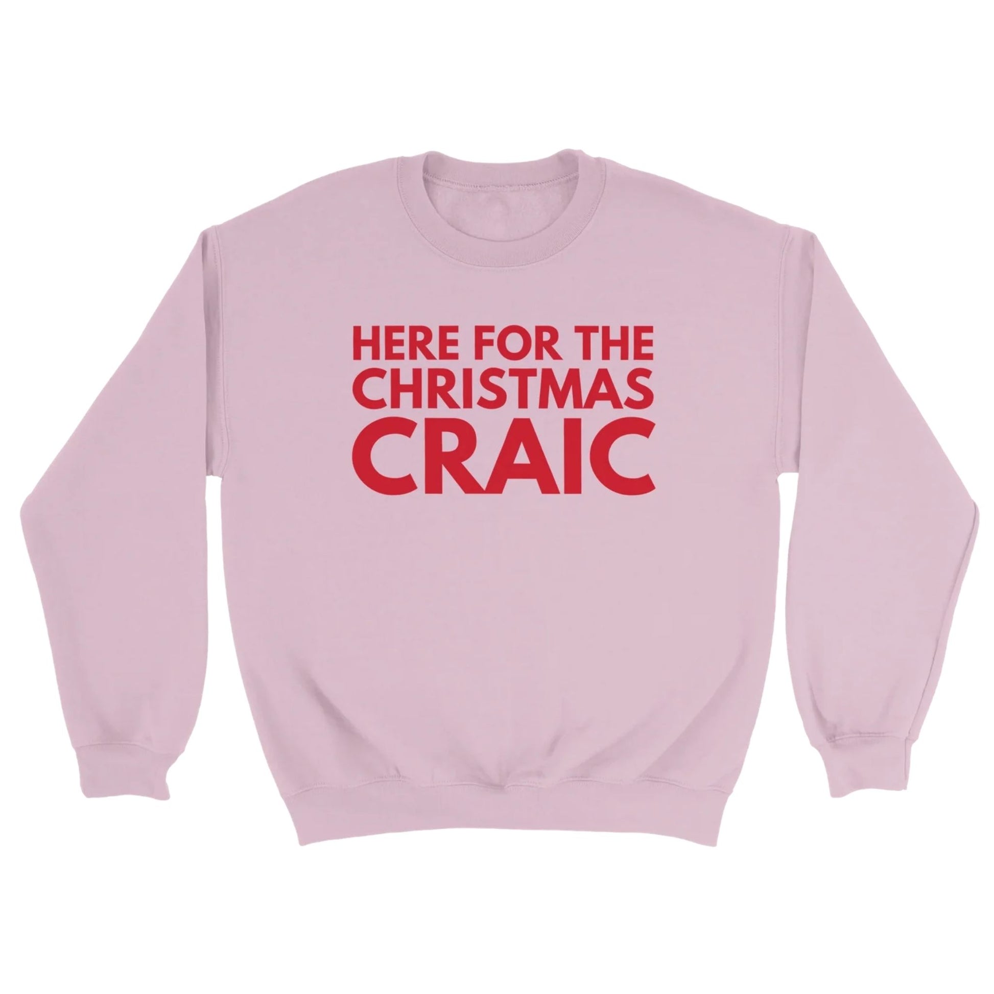 Pink sweatshirt with red text 'HERE FOR THE CHRISTMAS CRAIC' on a white background