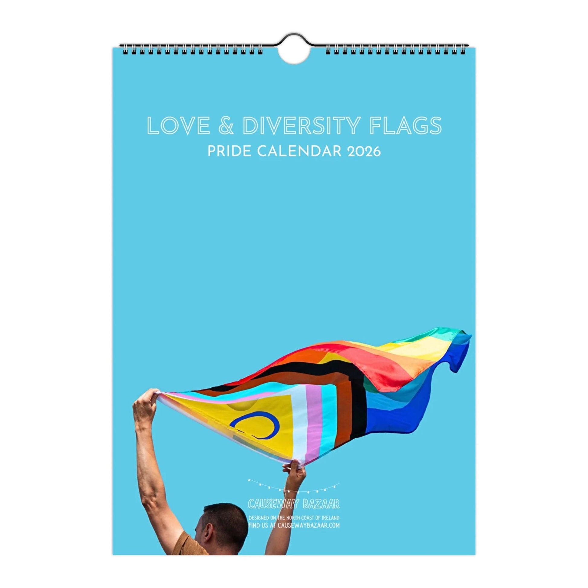 Pride calendar 2026 with a person holding a rainbow flag against a blue background