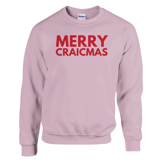 Pink sweatshirt with 'MERRY CRAICMAS' red text on a white background