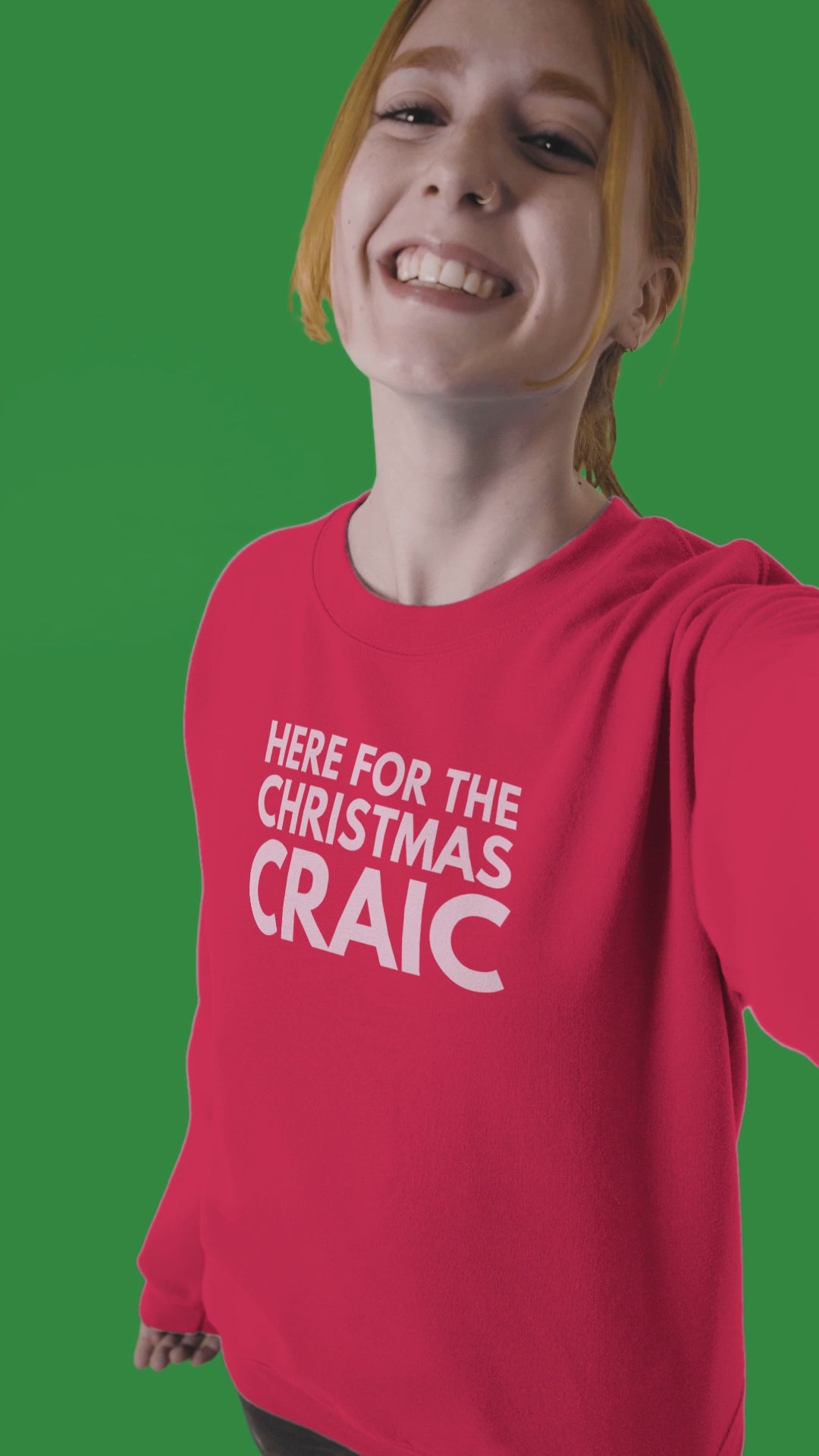 funny red irish christmas jumper with pink text saying here for the christmas craic