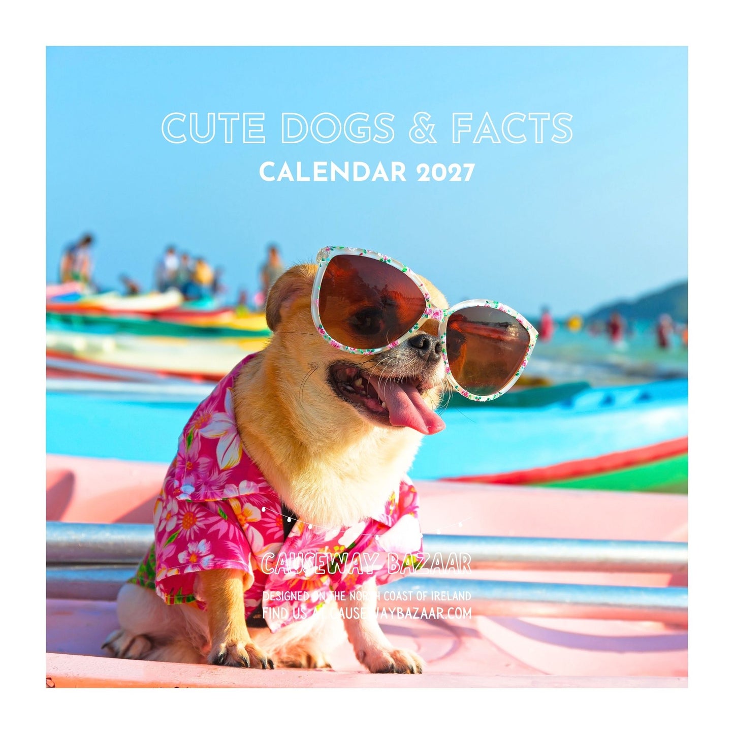 Square cover art for a 2027 calendar titled 'CUTE DOGS & FACTS CALENDAR 2027', featuring a small tan dog wearing oversized sunglasses and a pink floral shirt sitting on a pink boat with colorful boats and a beach in the background.