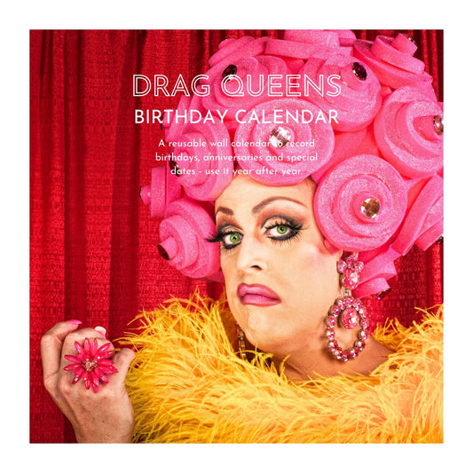 Drag queen with pink flowers and red curtain background, featuring text 'Drag Queens Birthday Calendar'.