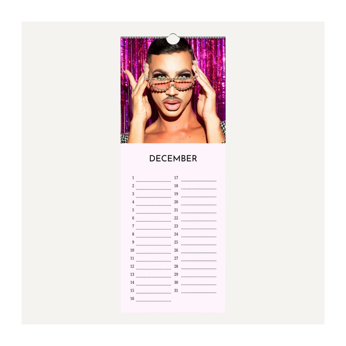 Drag Queens birthday calendar page for December with a person wearing sunglasses and a pink background.