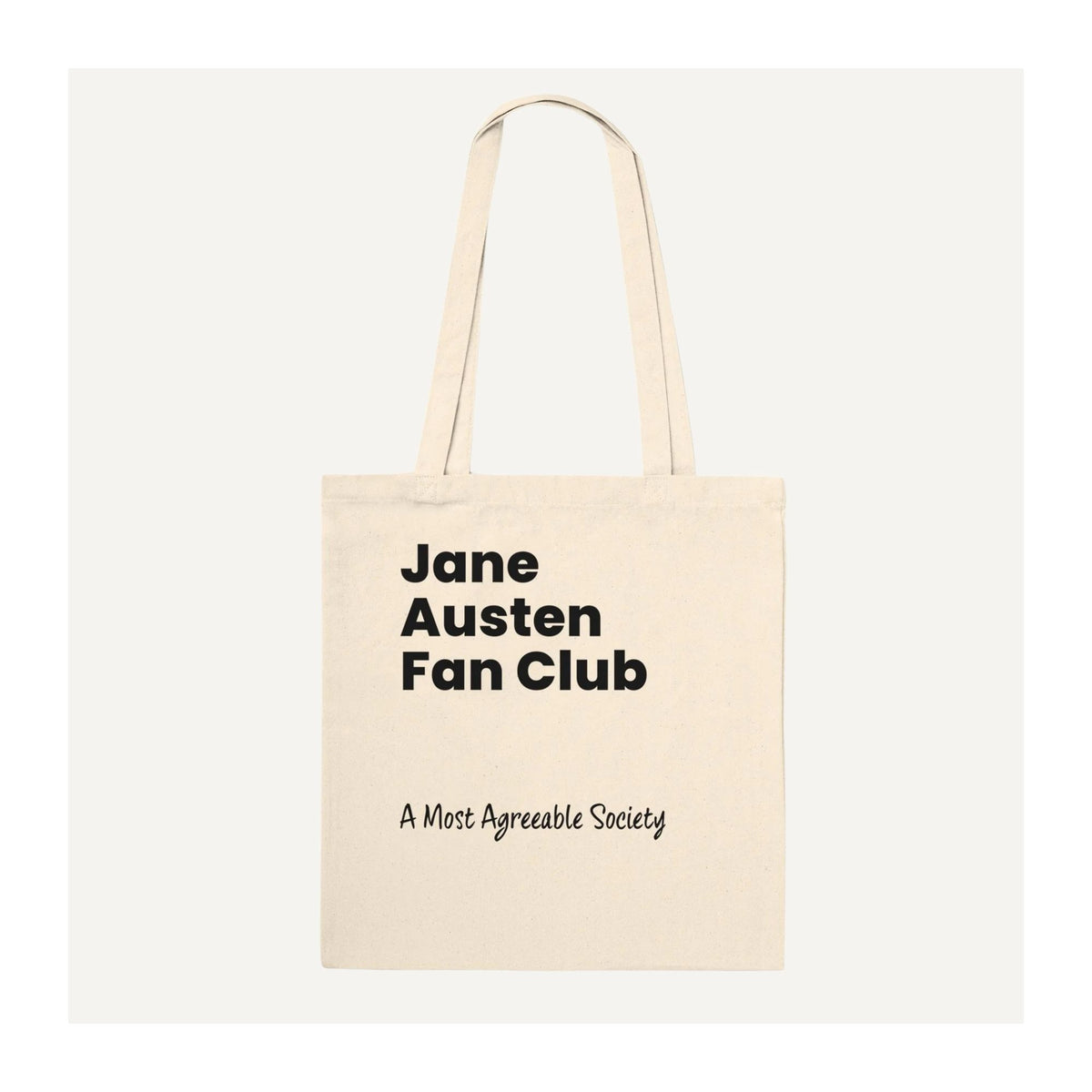 Natural cotton Jane Austen Fan Club tote bag with black typography and handwritten-style “A Most Agreeable Society” lettering.