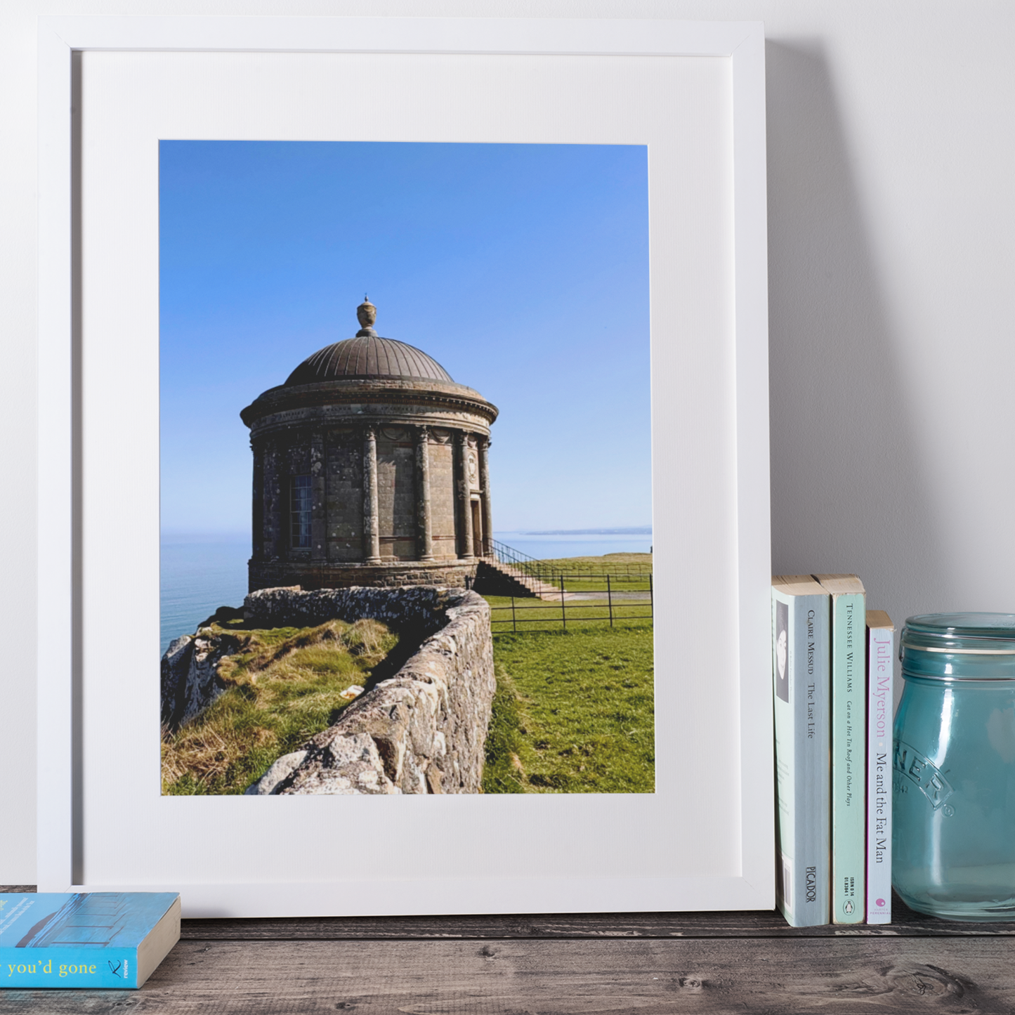 Mussenden Temple west view Downhill Northern Ireland in a white frame on a beach theme shelf