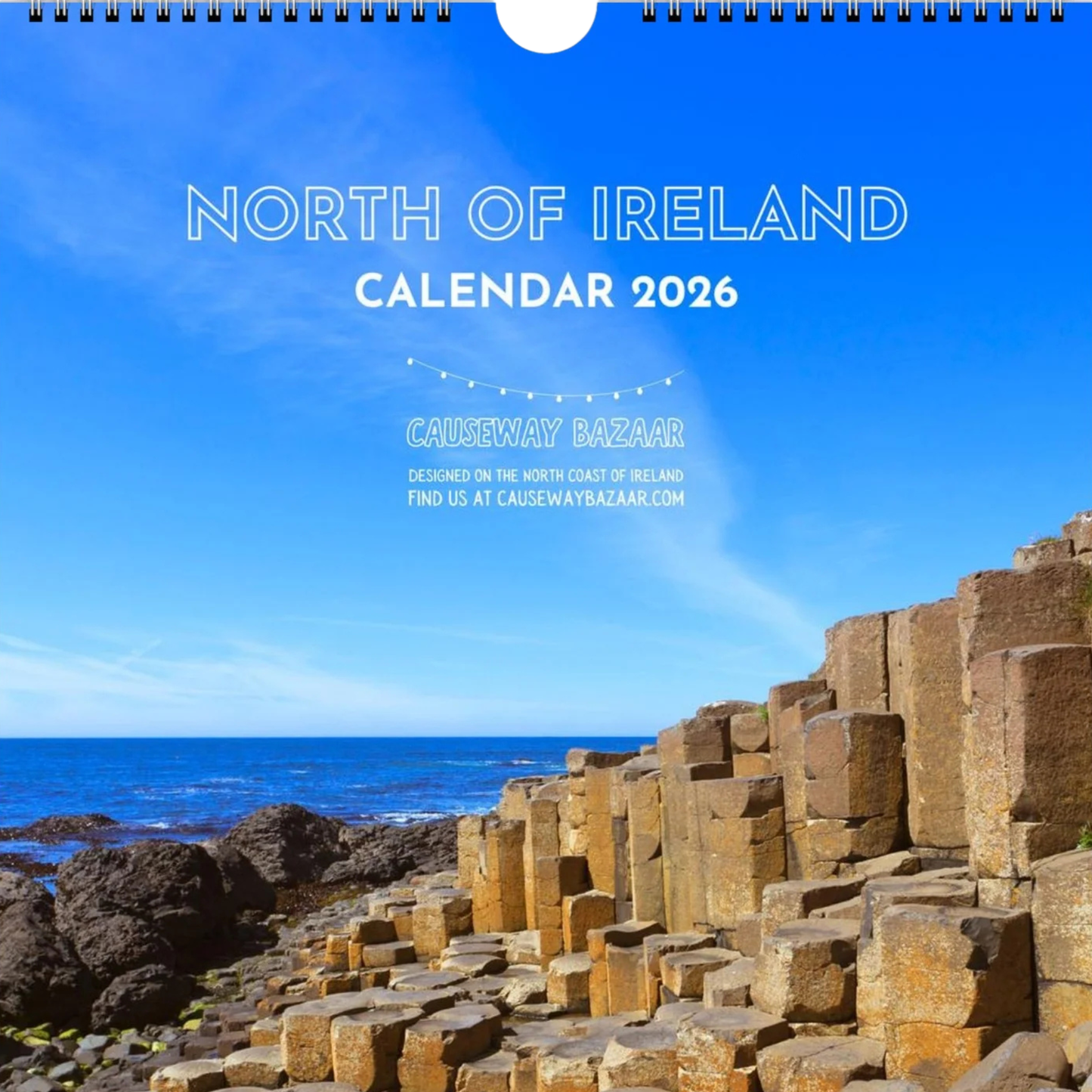Calendar cover for 2026 featuring the North of Ireland with a scenic view of rocks and ocean.