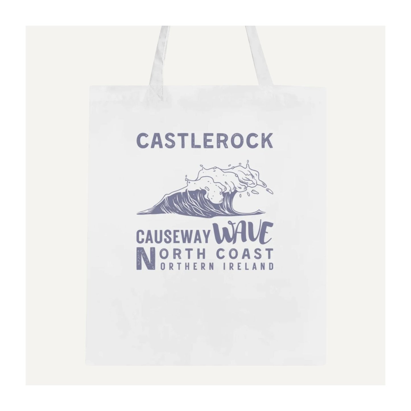 White tote bag with 'Castlerock Causeway Wave North Coast Northern Ireland' text and wave graphic.
