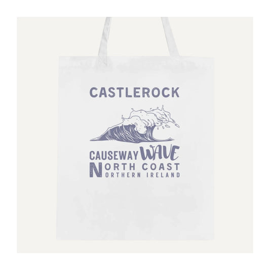 White tote bag with 'Castlerock Causeway Wave North Coast Northern Ireland' text and wave graphic.