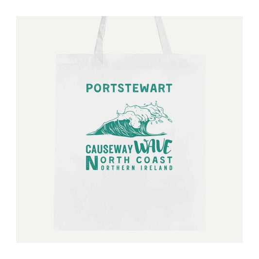 White tote bag with 'Portstewart Causeway Wave North Coast Northern Ireland' green text and wave design on a white background