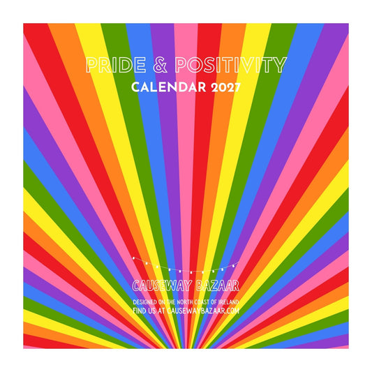 Pride & Positivity Calendar 2027 cover with bold rainbow sunburst design in red, orange, yellow, green, blue, purple and pink. Colourful LGBTQ+ wall calendar featuring positive Pride affirmations and uplifting messages throughout the year.