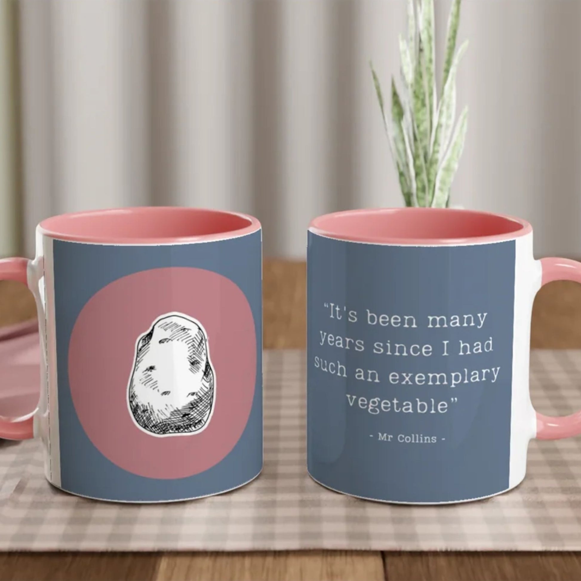 Jane Austen inspired mugs with a design and text on a table