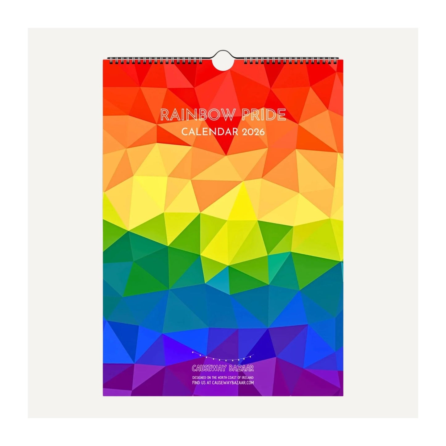 Calendar cover with rainbow pride design and text 'Rainbow Pride Calendar 2026' on a geometric pattern.
